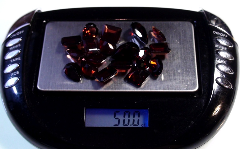 Garnet Faceted Gemstone Lot of 50 carets on Scale